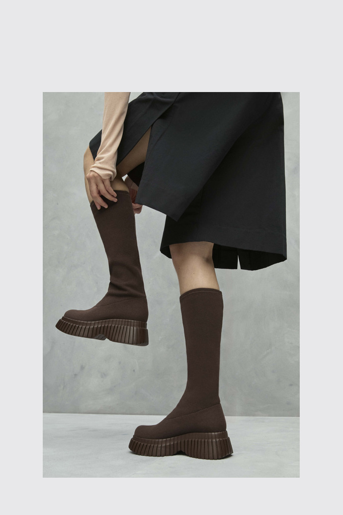 A model wearing BCN TENCEL® Brown textile boots for women