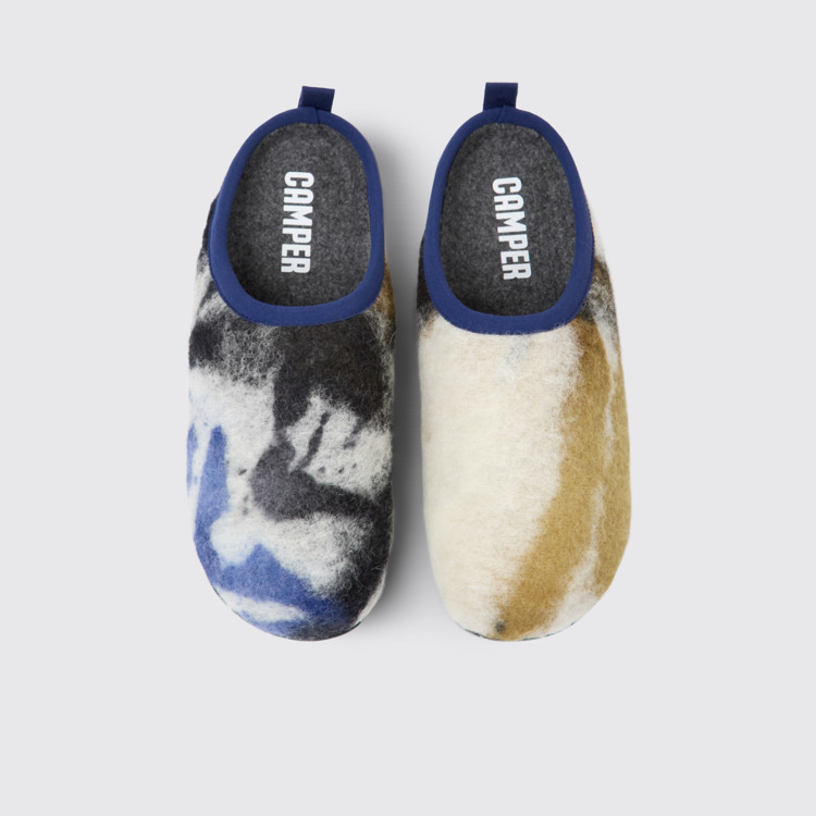 Overhead view of Wabi Blue, black, and white recycled wool slippers for women