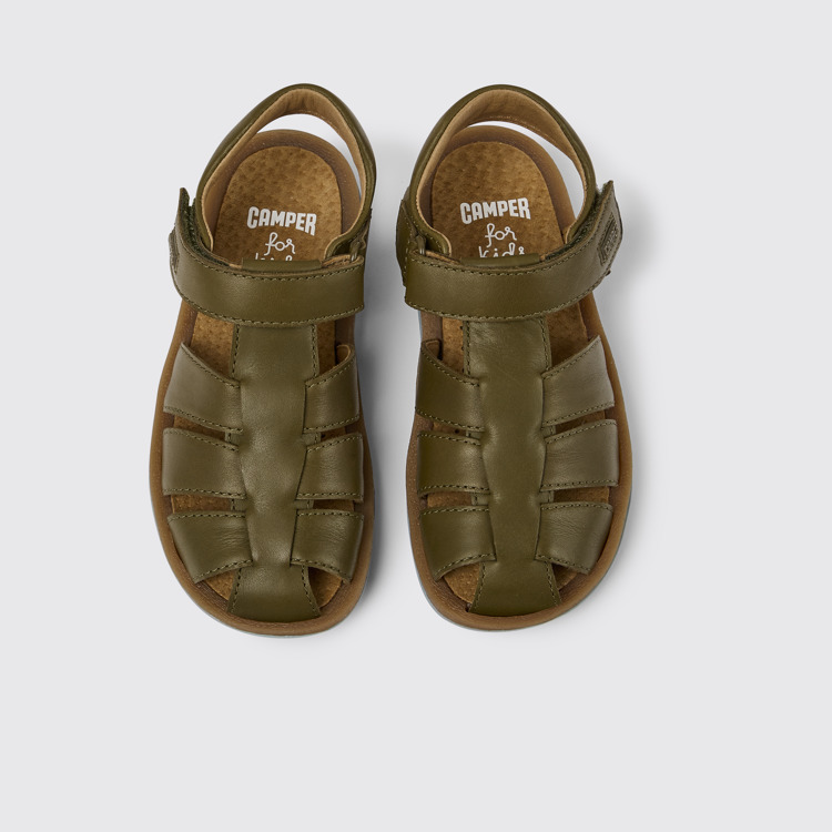 Overhead view of Bicho Green leather sandals for kids