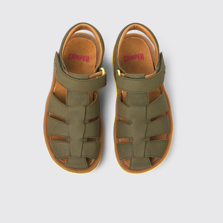 Overhead view of Bicho Green leather sandals for kids