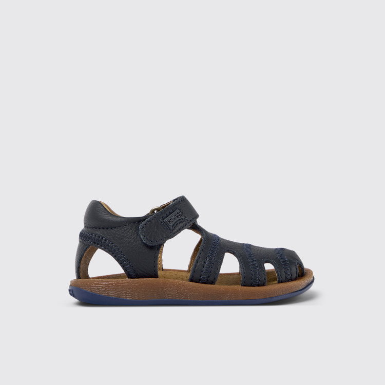 Side view of Bicho Closed navy T-strap sandal for kids