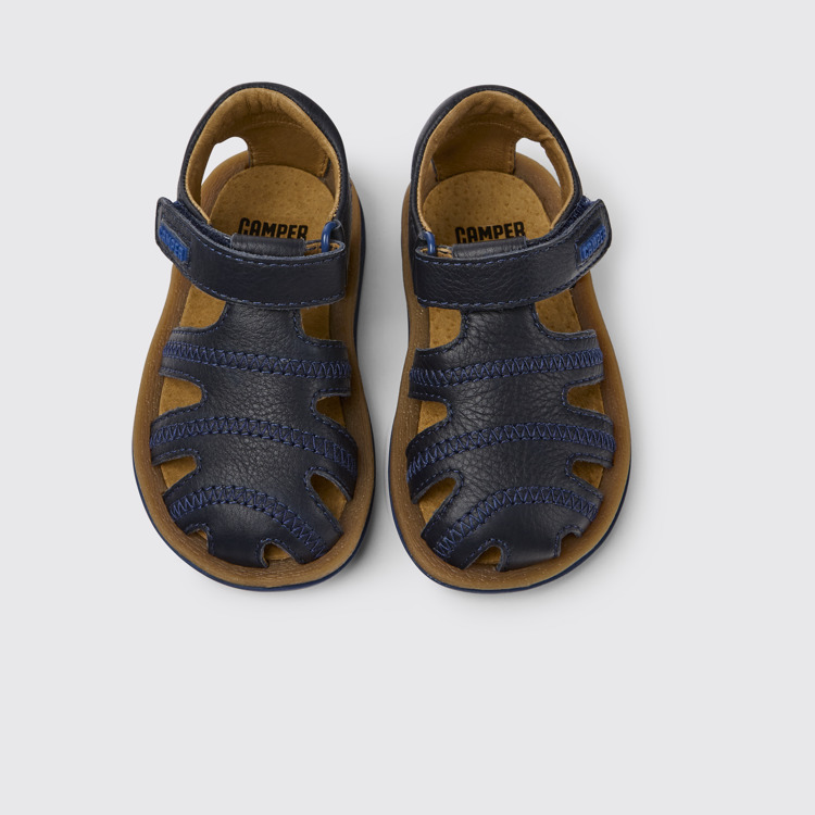 Overhead view of Bicho Blue leather sandals for kids