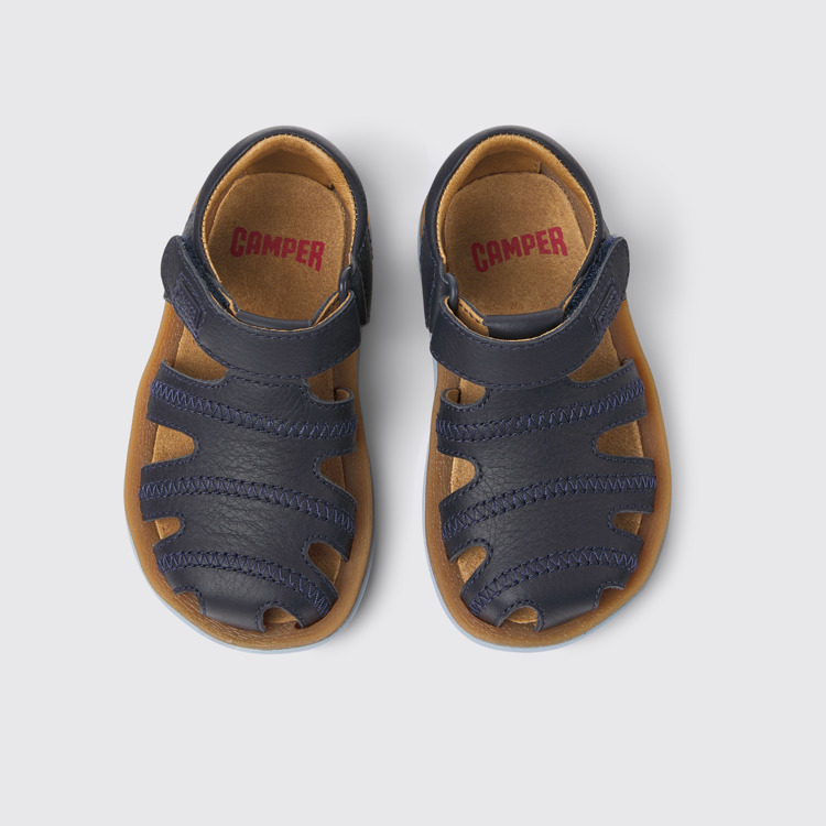 Overhead view of Bicho Navy blue leather sandals for kids