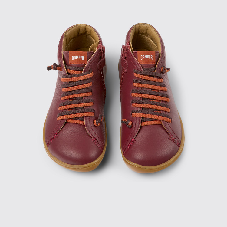 Overhead view of Peu Burgundy leather ankle boots for kids