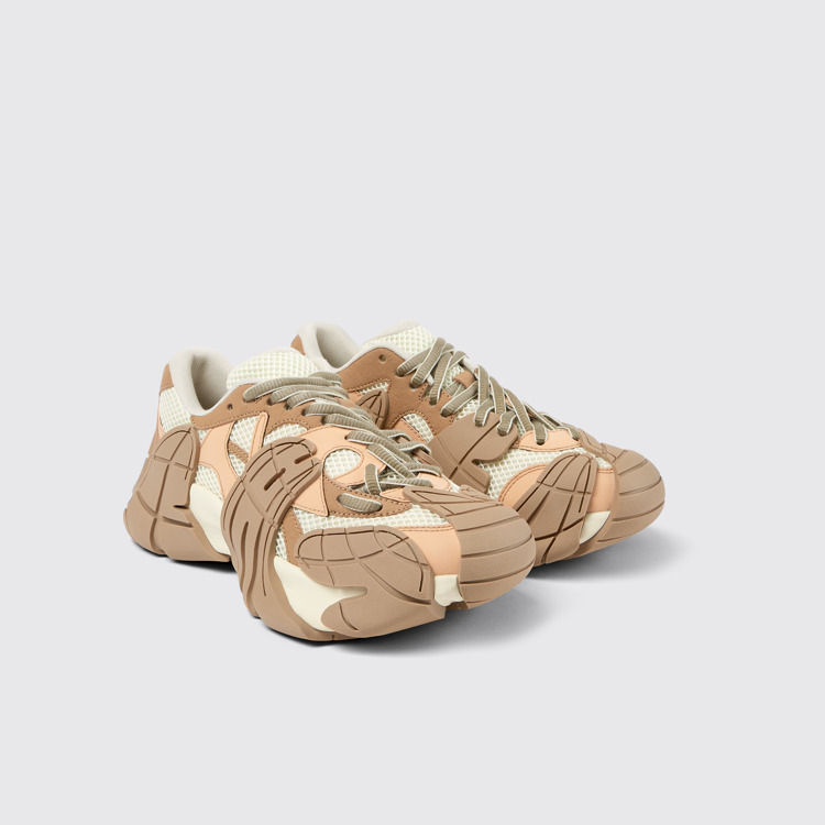 Front view of Tormenta Beige and white sneakers