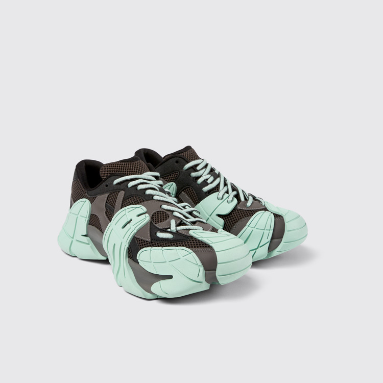 Front view of Tormenta Gray and light green sneakers