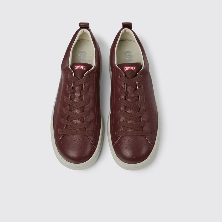 Overhead view of Runner Burgundy leather sneakers