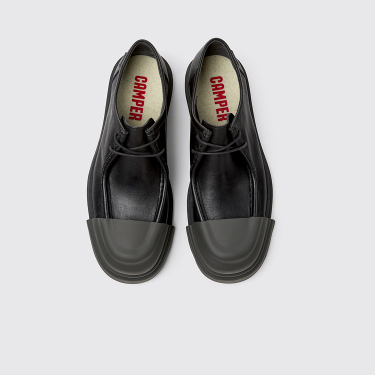 Junction Sapatos em couro preto para homem.