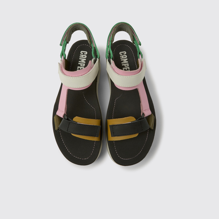 Overhead view of Oruga Up Green, pink, and white leather sandals for women