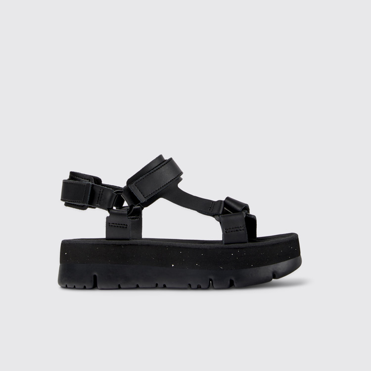 Side view of Oruga Up Black leather sandals for women