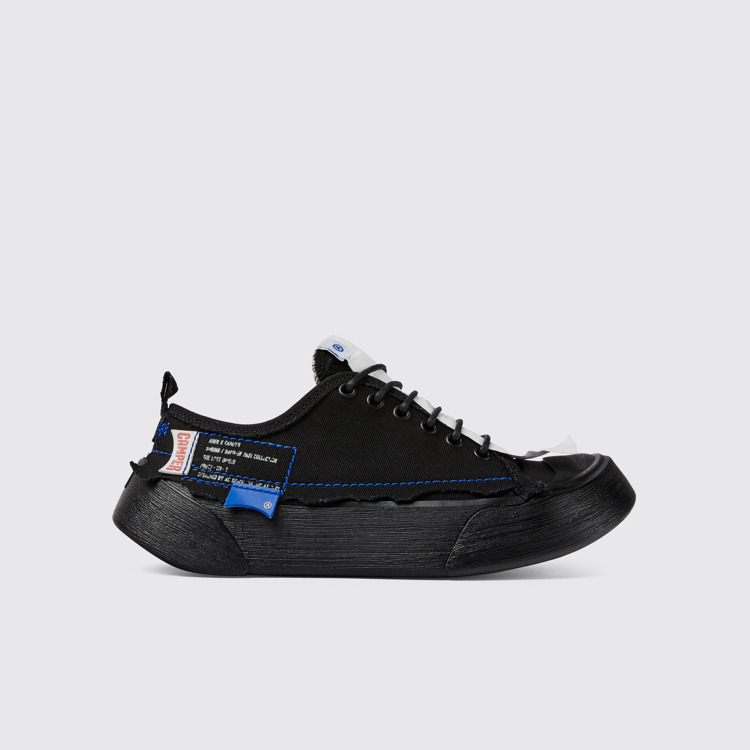 Side view of ADERERROR Black sneakers