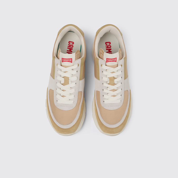 Overhead view of Drift Beige, white, and brown sneakers for women