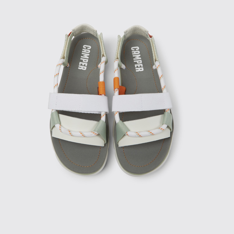 Overhead view of Oruga White, green, and orange sandals for women