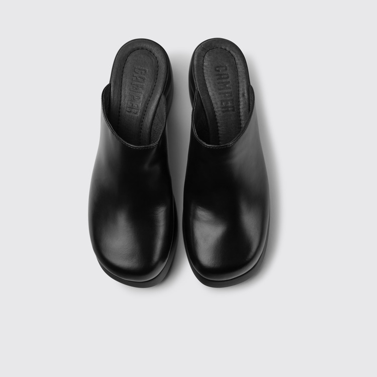 Overhead view of Kaah Black leather clogs