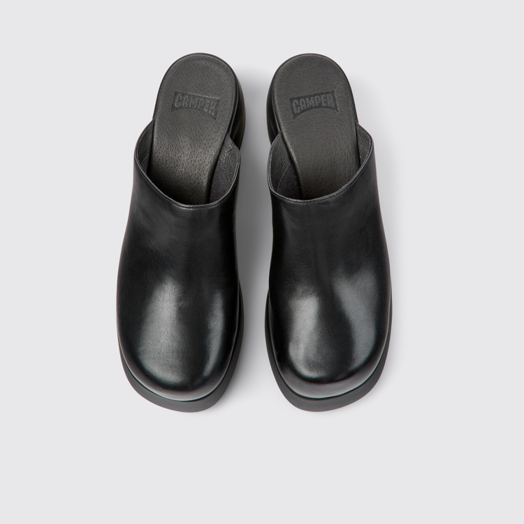 Overhead view of Kaah Black leather mules for women