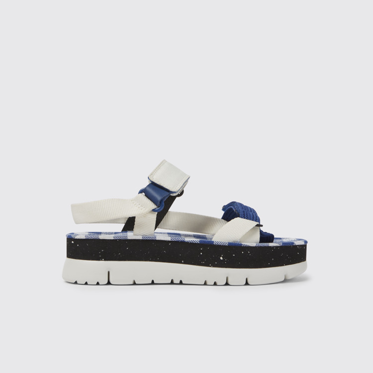 Side view of Oruga Up White, blue, and black sandals for women