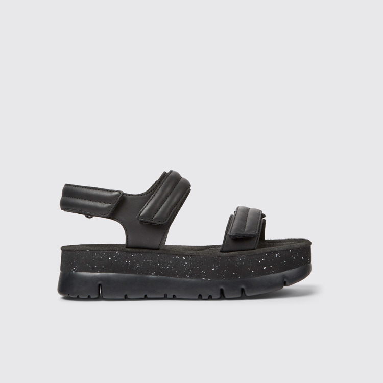 Side view of Oruga Up Black leather sandals for women