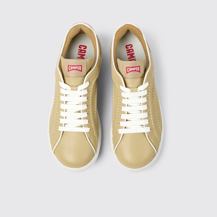 Overhead view of Pelotas XLite Beige leather sneakers for women