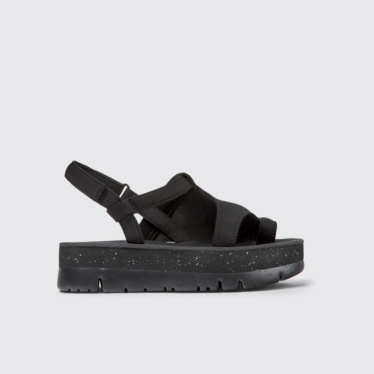 Side view of Oruga Up Black textile sandals for women