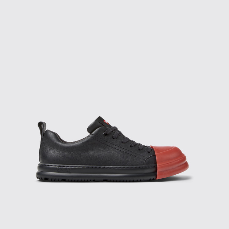 Junction Runner Sneaker de dona de pell de color negre.