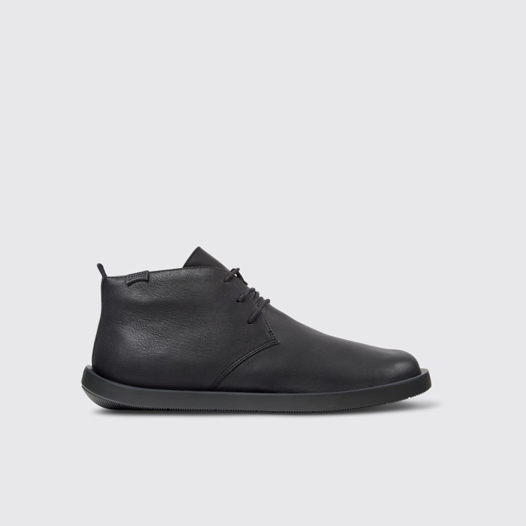 Side view of Wagon Black Leather Ankle Boots for Men.