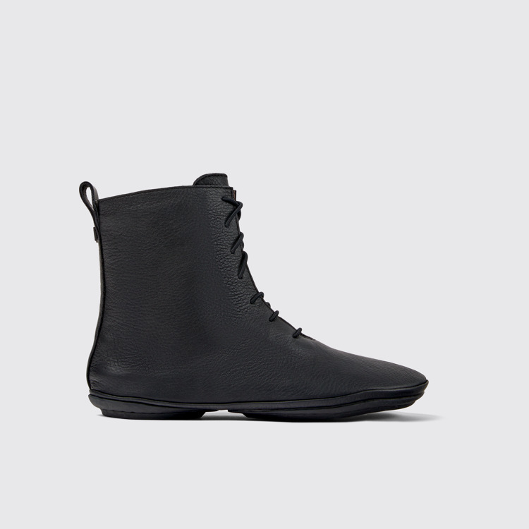 Side view of Right Black leather ankle boots