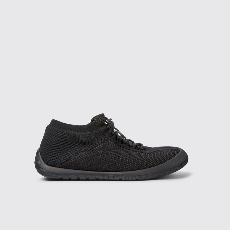 Side view of Path Black textile sneakers for women