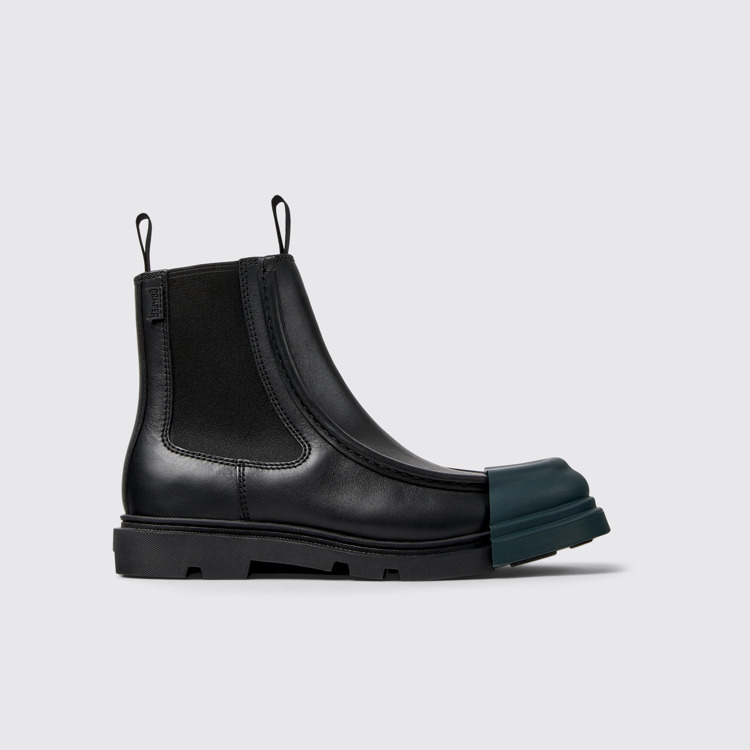 Side view of Junction Black leather chelsea boots for women