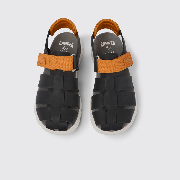 Overhead view of Oruga Black and orange leather sandals for kids