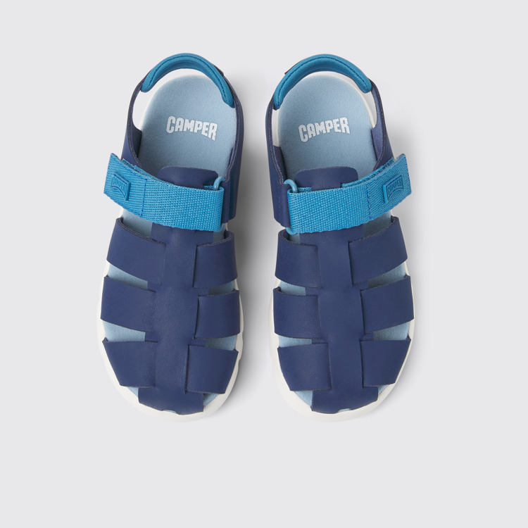 Overhead view of Oruga Blue leather sandals for kids