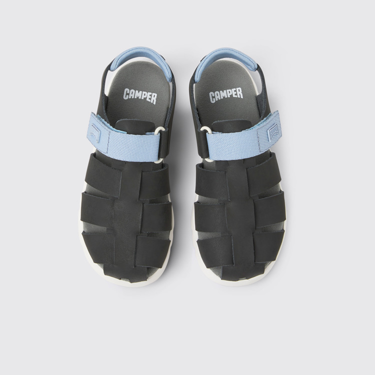 Overhead view of Oruga Black leather sandals for kids