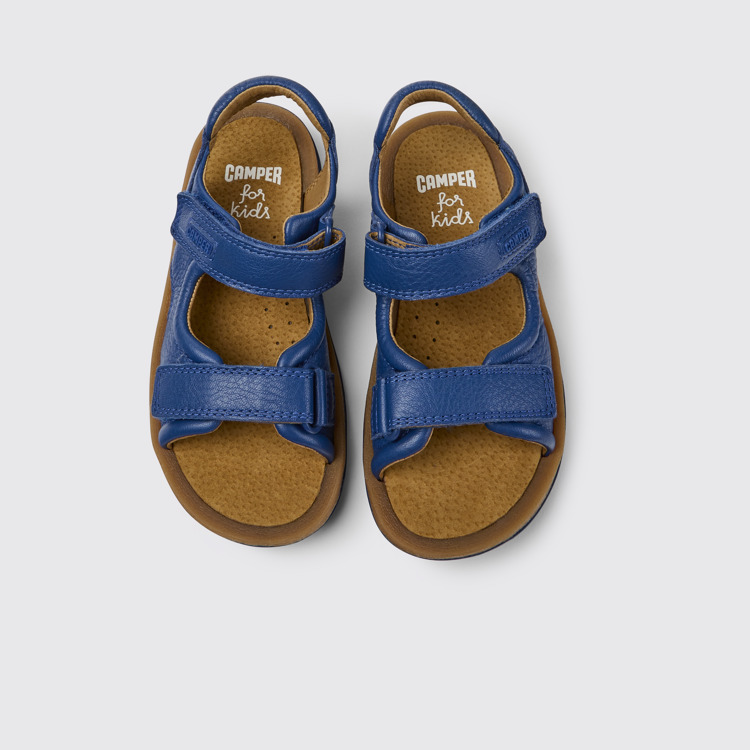 Overhead view of Bicho Blue leather sandals for kids