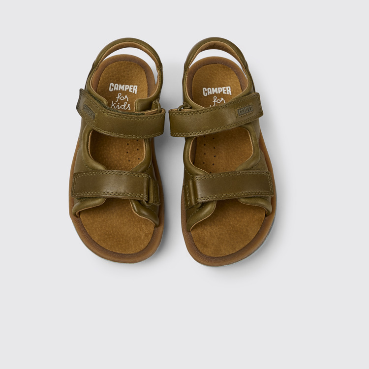 Overhead view of Bicho Green leather sandals for kids