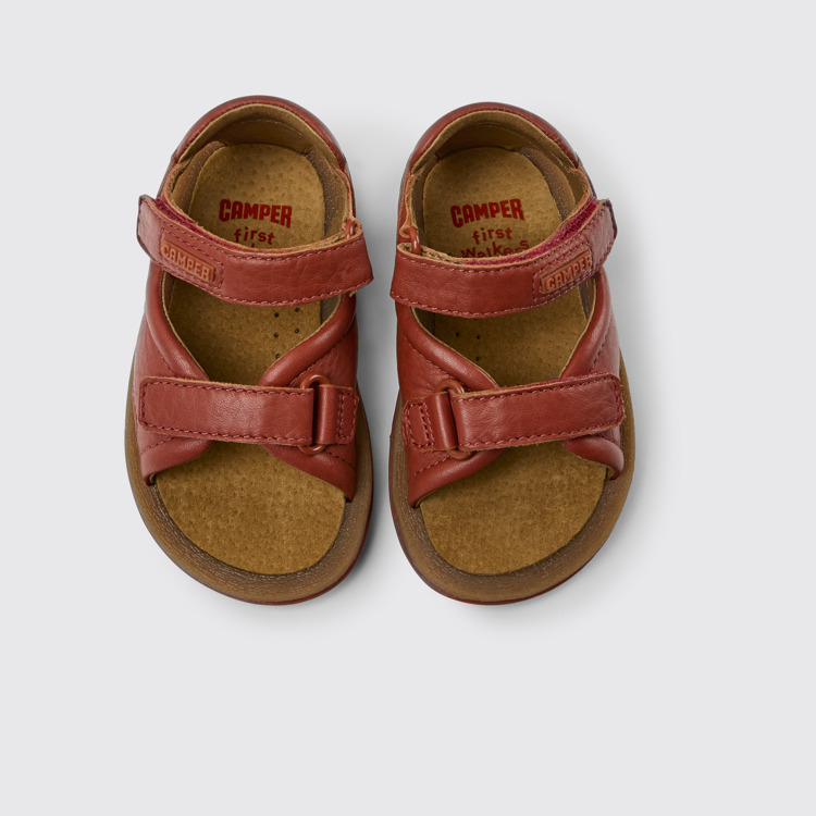 Overhead view of Bicho Red leather sandals for kids