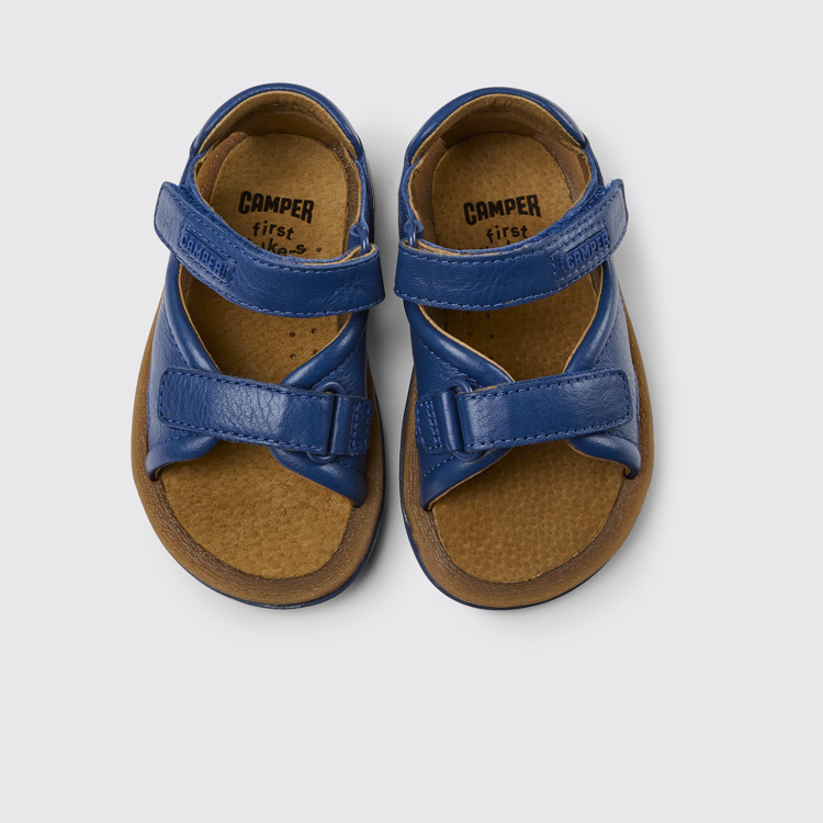 Overhead view of Bicho Blue leather sandals for kids