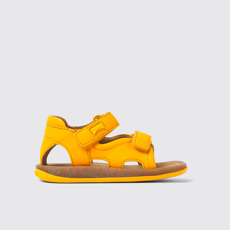 Side view of Bicho Yellow leather sandals for kids