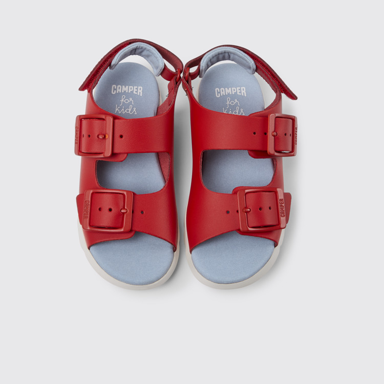 Overhead view of Oruga Red leather sandals for kids