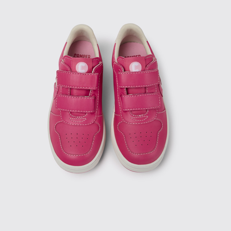 Overhead view of Runner Pink and white leather sneakers for kids