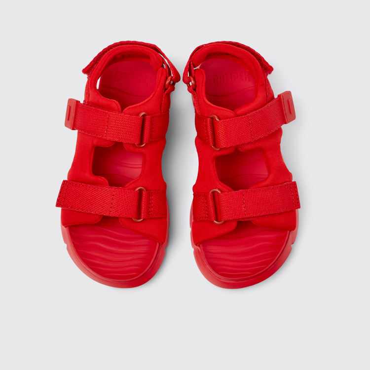 Oruga Sandal infantil de teixit de color vermell.