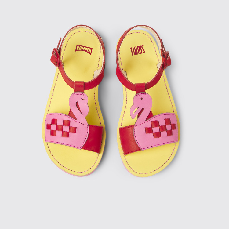 Overhead view of Twins Red and pink leather sandals for kids