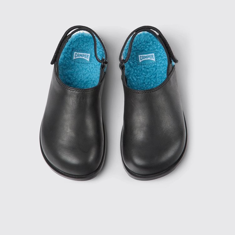 Overhead view of Brutus Black leather clogs for kids