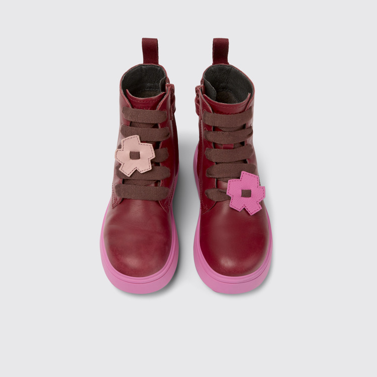 Overhead view of Twins Burgundy and pink leather lace-up boots