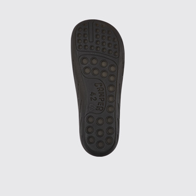 The sole of Wabi Black monomaterial sandals for men