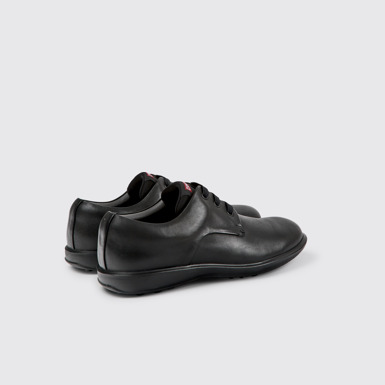 Back view of Atom Work Black Leather Shoes for Men.