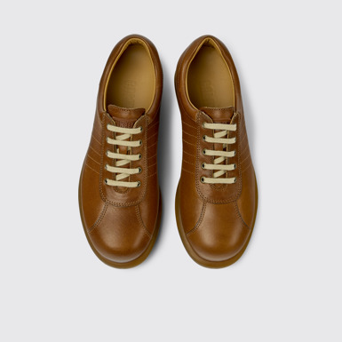 Overhead view of Pelotas Brown leather sneakers for women