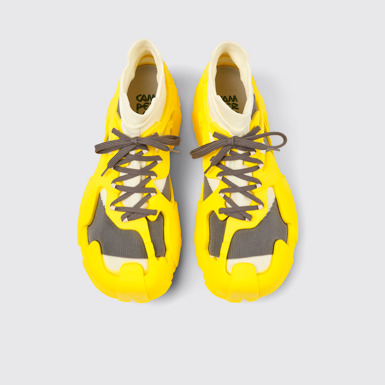 Overhead view of Tossu Yellow caged sneakers