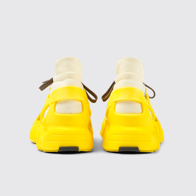 Back view of Tossu Yellow caged sneakers