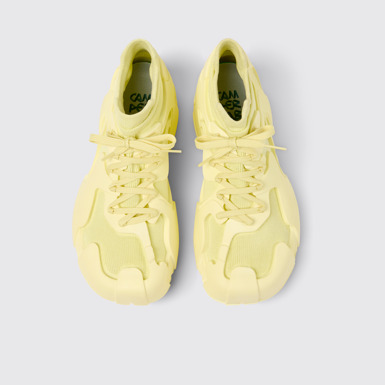 Overhead view of Tossu Yellow Caged Sneakers