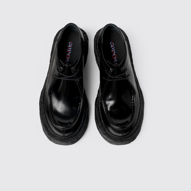 Overhead view of Vamonos Black Leather Lace-Up Shoes