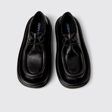 Overhead view of Aqua Black leather shoes